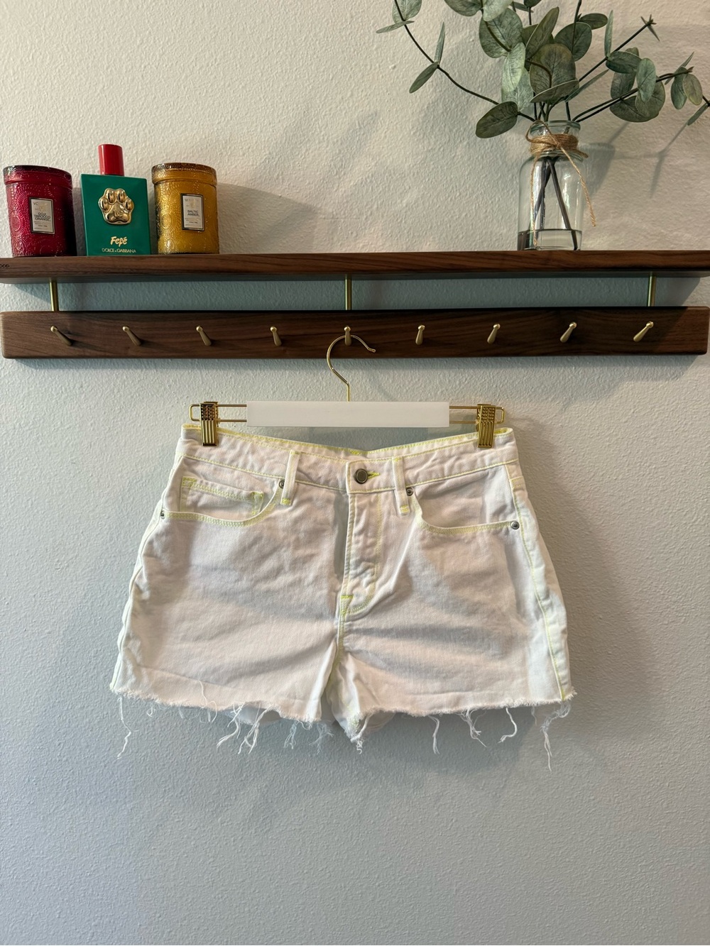 Good American White Denim Cutoff Shorts with Yellow Contrast Stitching